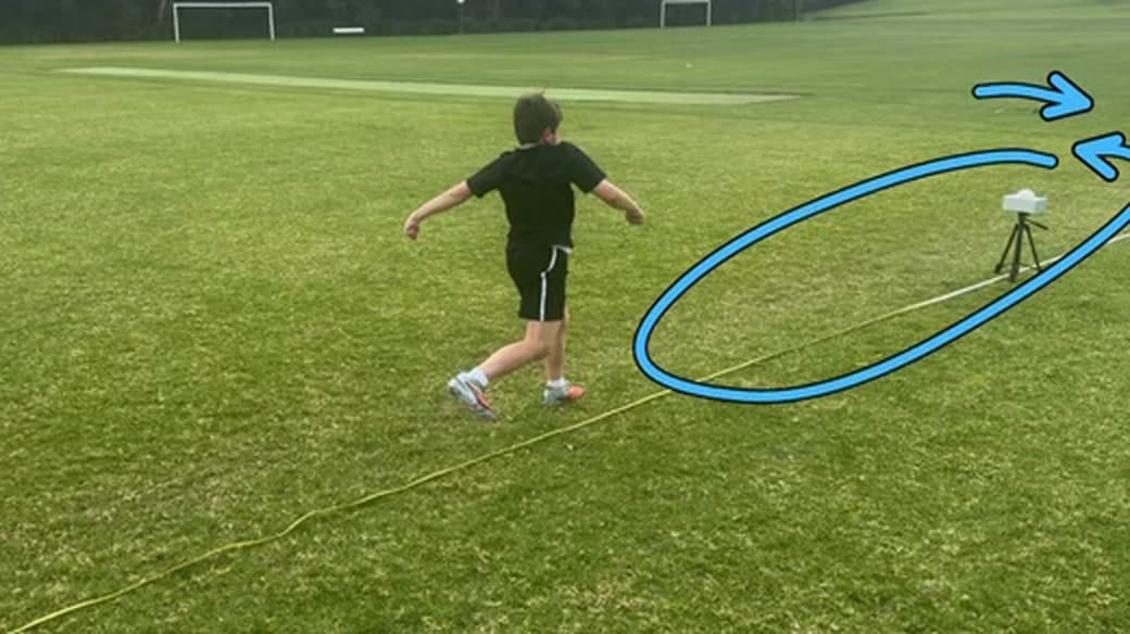 Bound frame with the athlete's trajectory drawn and an arrow showing vertical travel